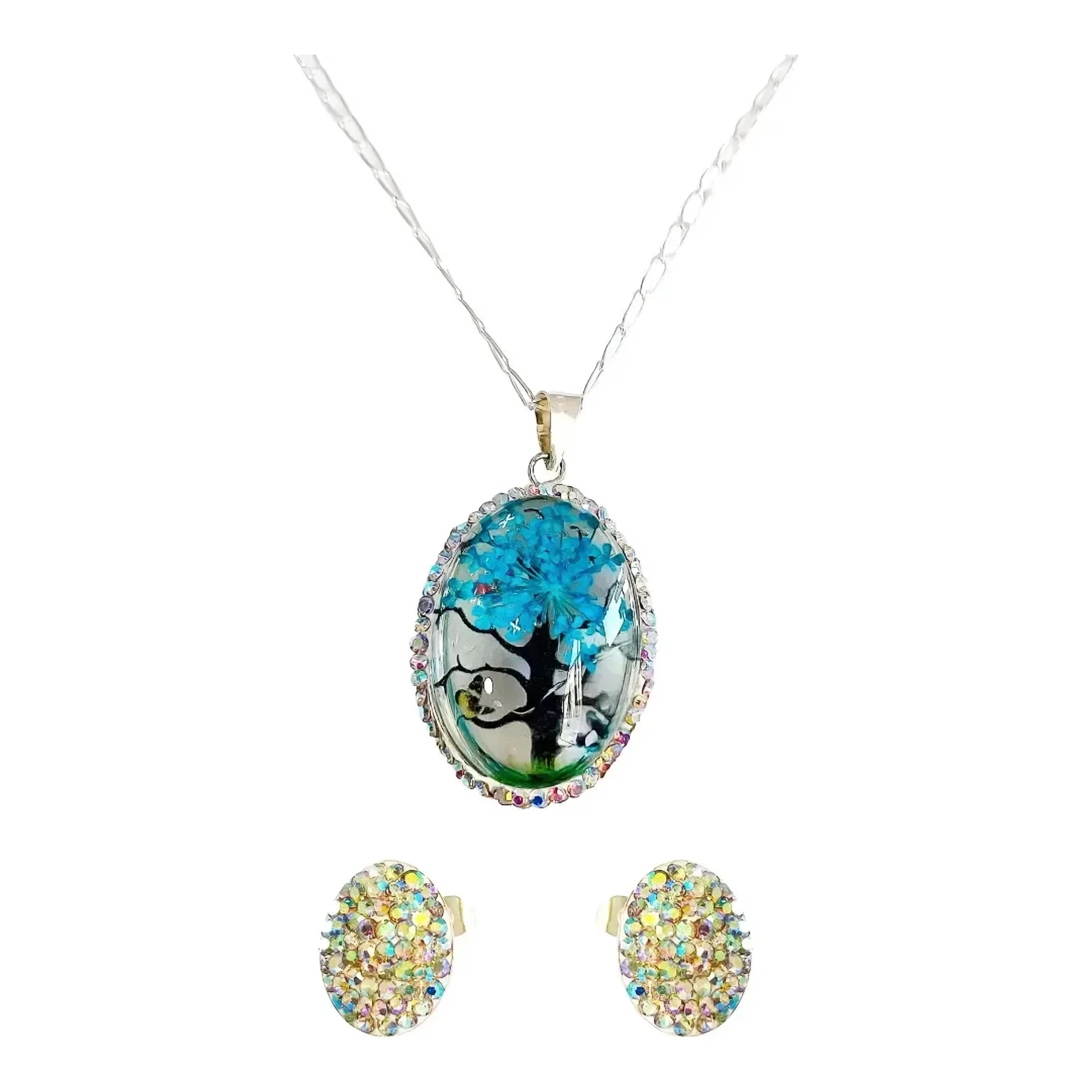 Dije árbol de la vida ovalado en plata ley 925 con zirconia azul, aretes y cadena Figaro de 50 cm en joyería fina mexicana